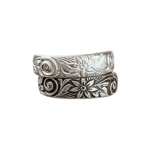 Floral Swirl Boho Rings engraved with a boho style flower and swirl pattern shown in bright (top) & antiqued (bottom) sterling silver finishes.