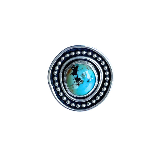 Golden Hills Turquoise Hat Pin - front - featuring bright blue Golden Hills Turquoise, this timeless design features turquoise surrounded by a beaded band with an outer plain band around the edge.