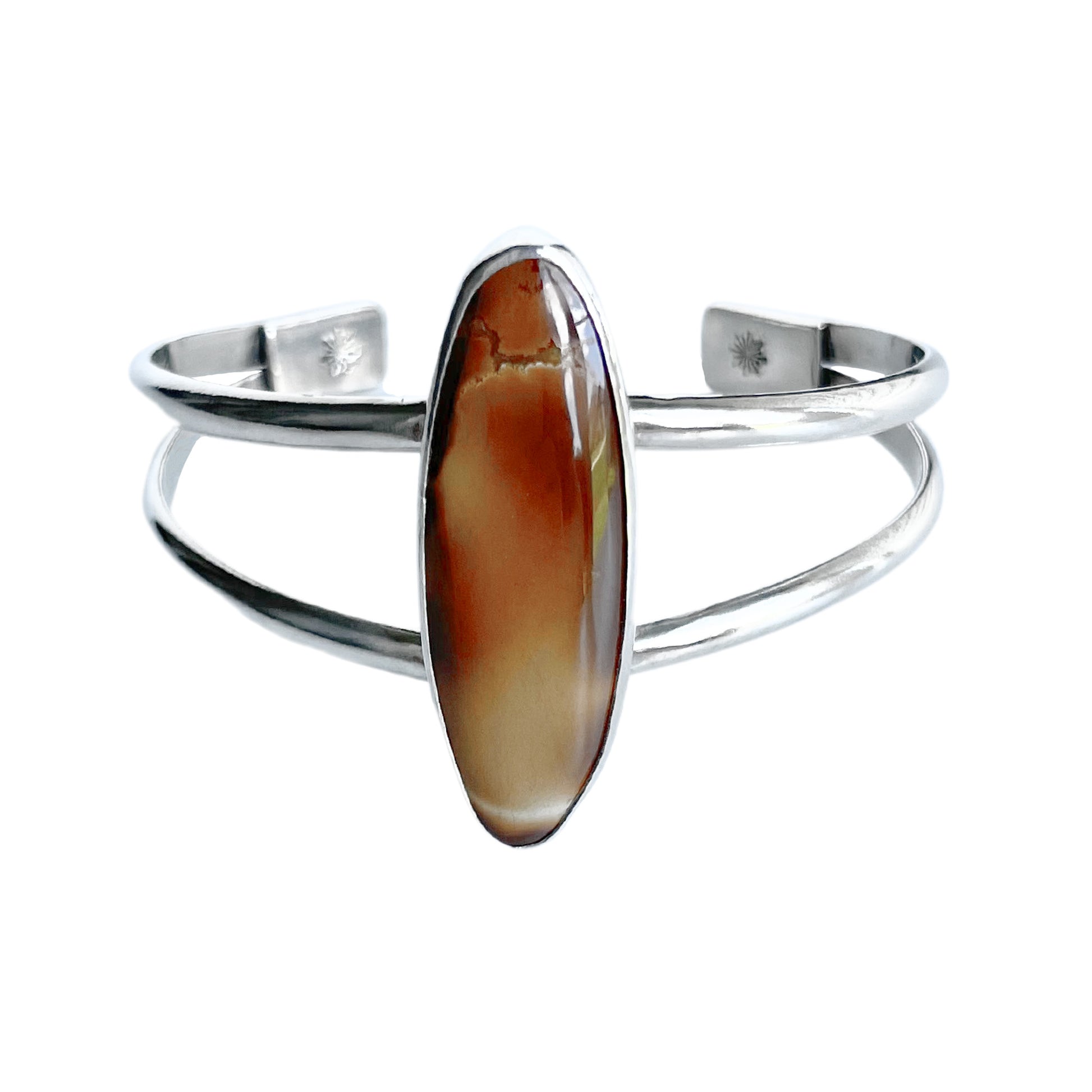 Treasure Mountain Turquoise Silver Cuff Bracelet - front view - the elegant long oval shaped turquoise takes center stage in a simple setting on a sturdy double band sterling silver cuff.