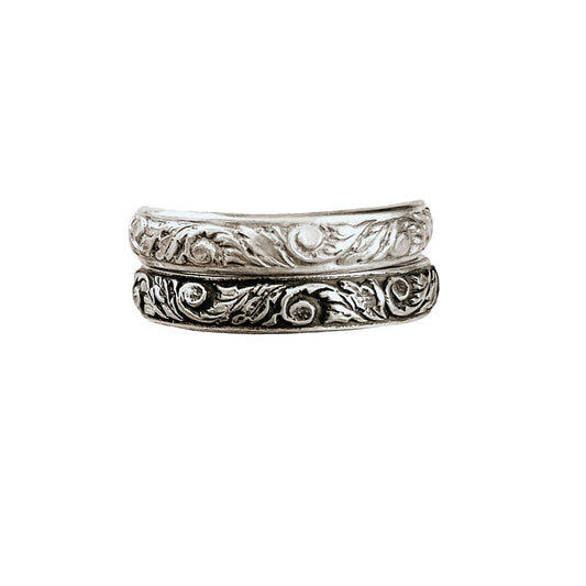 Western Floral Sterling Silver Stacking Rings in bright (top) and antiqued (bottom) sterling silver.