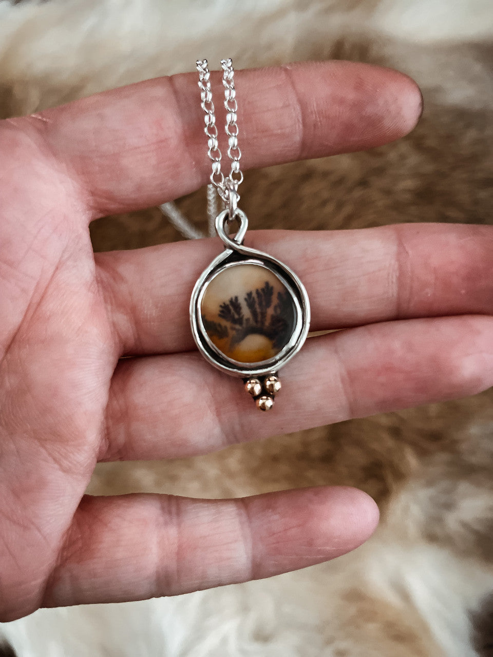 Dendritic Agate Sterling Silver Necklace - the warmth of the agate is accented with a cluster of brass beads at the bottom.