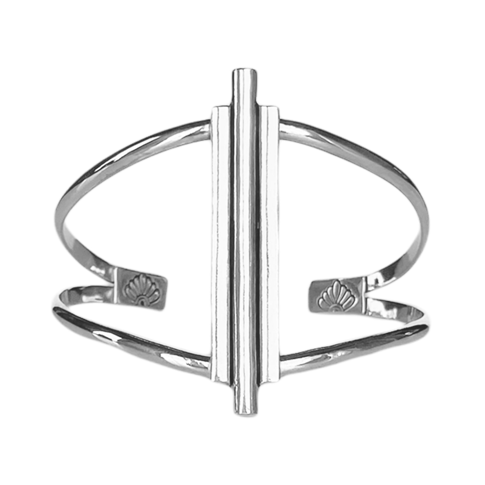 Art Deco inspired sterling silver cuff bracelet. The focal is a 3 bar design with the middle bar slightly longer than the 2 side bars. The cuff features a double band with stamped accents on the ends.