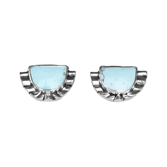 Pair of half moon pale blue turquoise stud earrings featuring hand-shaped silver moonbeams accenting the curves of the stones