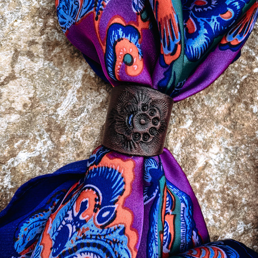 Deep purple mahogany stamped leather slide with half moon center cut out on multicolor silk bandana.